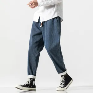 CLASSIC TAPERED DENIM PANTS